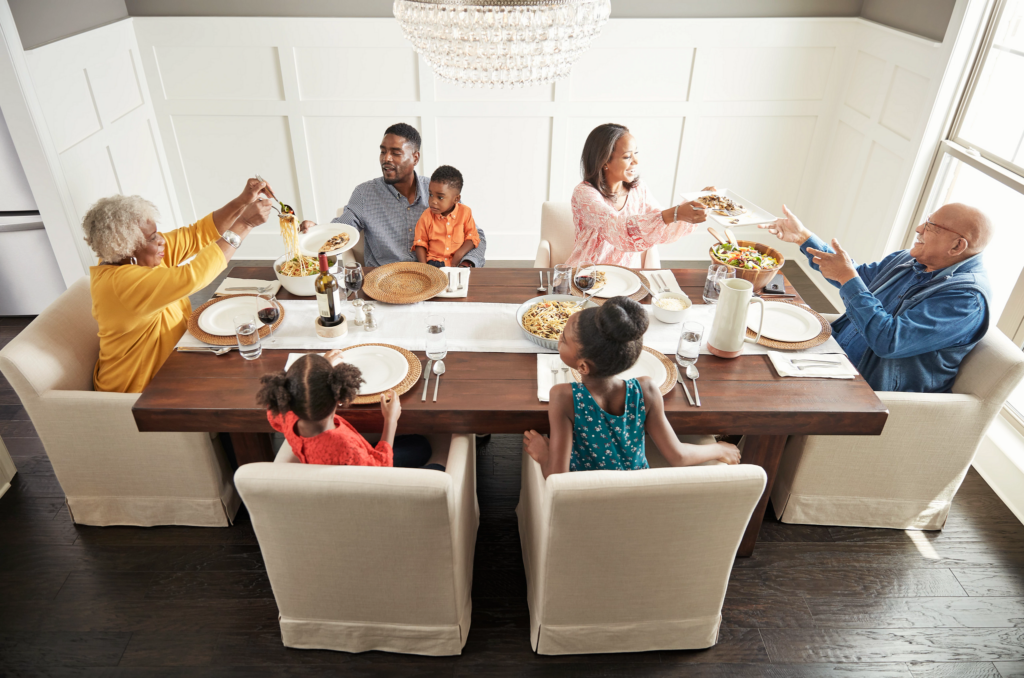 Family having breakfast at the dining table | Hernandez Wholesale Flooring