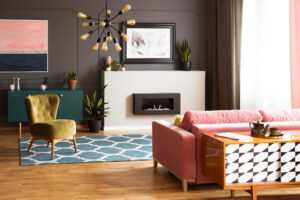Stylish living room with layered area rug over laminate flooring